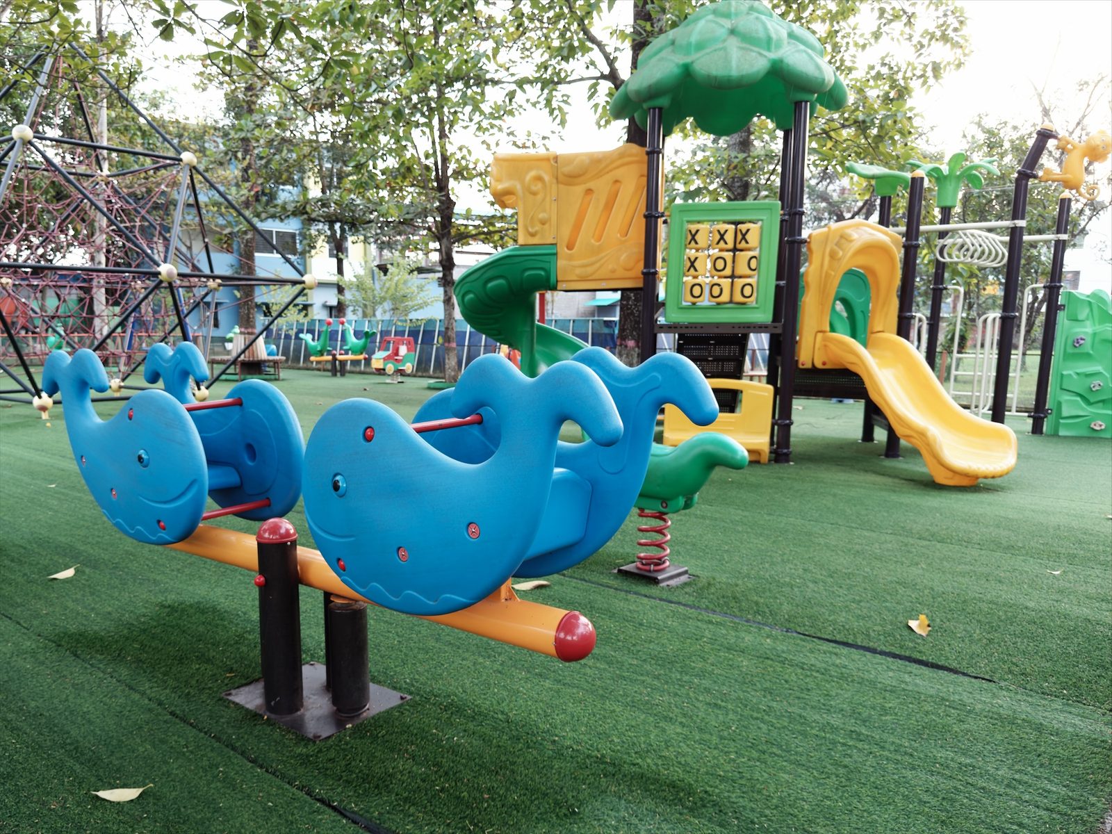 A playground with blue whale seesaws, developed with Chrome