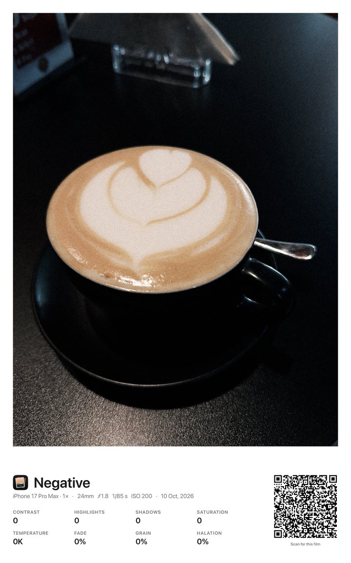 A coffee photo on a Film Card, with the film's settings and a code that loads it